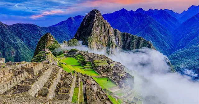 Machu Picchu stone terraces on a mountain ridge