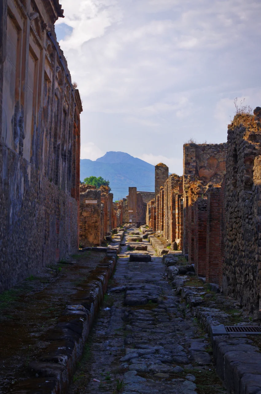 Stone street and surviving ruins at Pompeii
