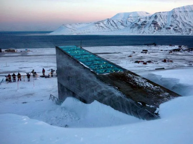 Snow-covered entrance of the Svalbard Global Seed Vault