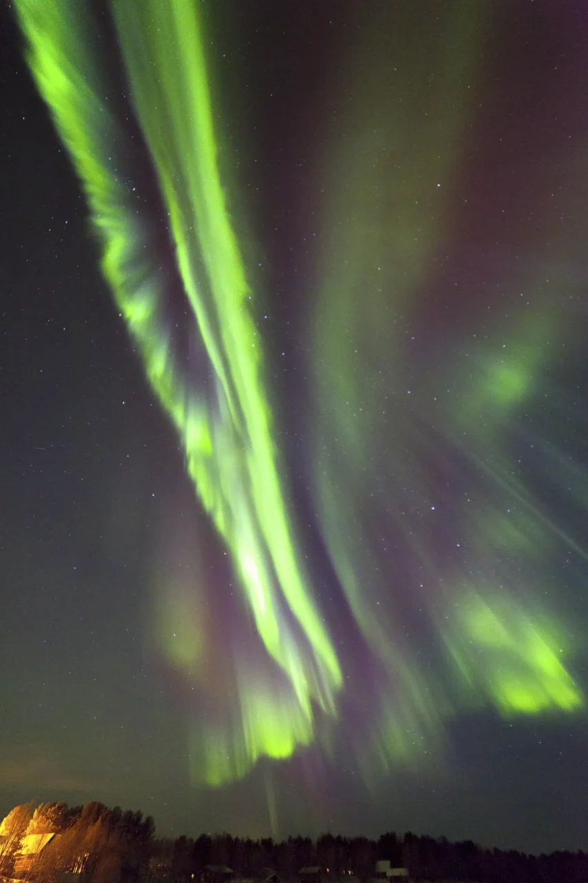 Colored auroral light across the northern night sky