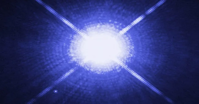 Illustration of a compact white dwarf star and surrounding light